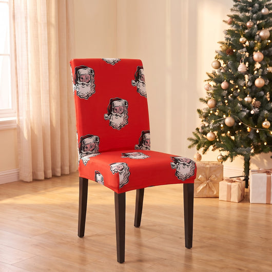 Vintage Santa Christmas stretch chair cover on a dining chair by the Christmas tree