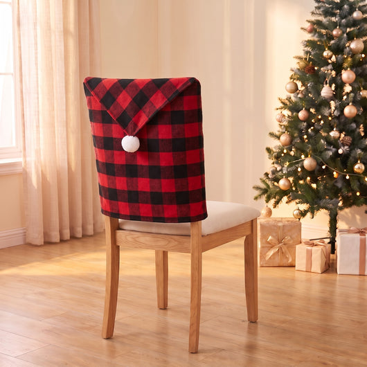 Buffalo Plaid Hat Christmas chair back cover on a dining chair by the Christmas tree